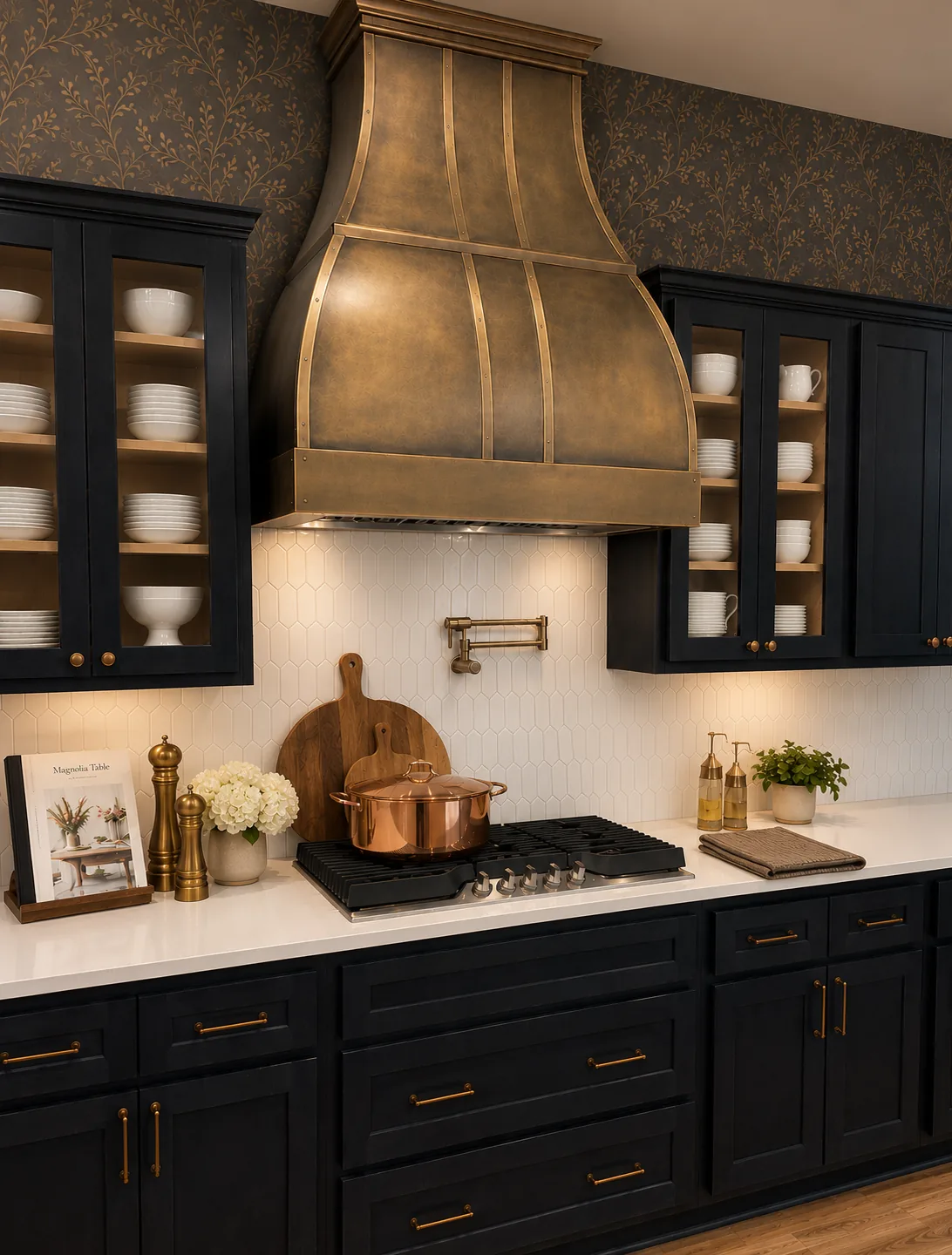 Beach home kitchen with brass range hood